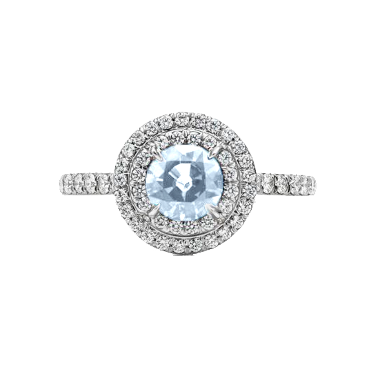 A 0.75-carat round-cut Diamond set in a double halo of 0.50-carat pavé diamonds. Crafted in 18K white gold with additional pavé diamonds on the band, bringing the total carat weight to 1.25.