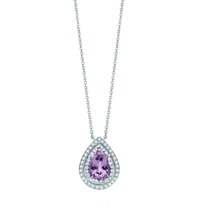 This necklace showcases a 1.5-carat pear-shaped amethyst at its center, surrounded by a double halo of 0.3-carat round diamonds, all set in polished white gold. The amethyst’s vibrant purple hue pairs elegantly with the sparkling diamonds, creating a refin