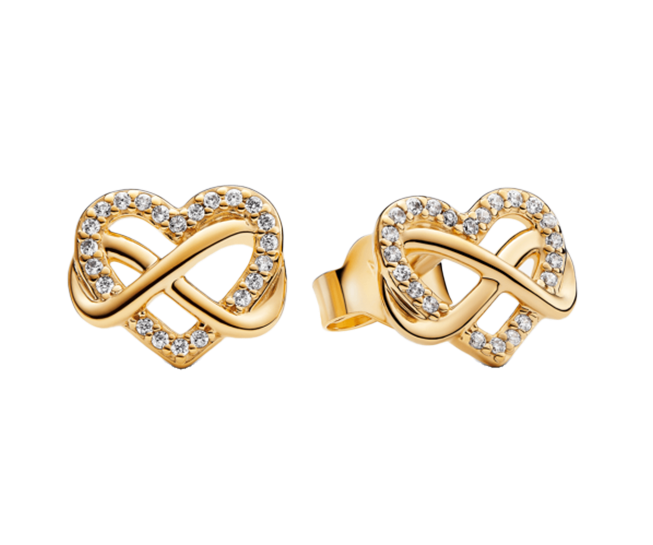 Featuring a 0.70-carat brilliant-cut center diamond and a halo of 22 smaller diamonds, this 18k yellow gold piece weighs 0.40 carats in accent stones.