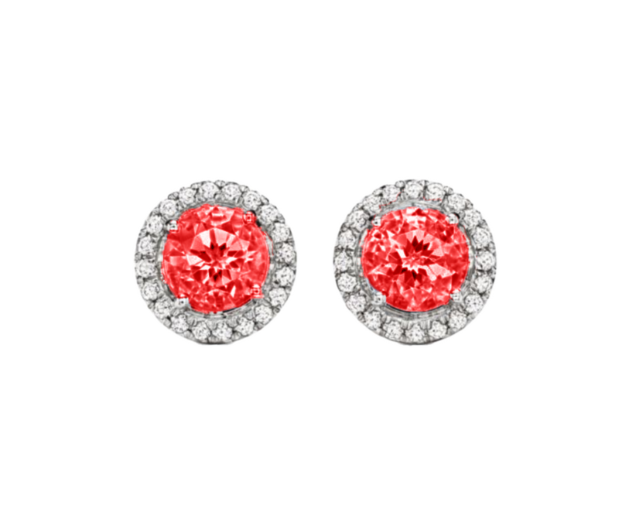 A 0.75-carat round-cut ruby set in a double halo of 0.50-carat pavé diamonds. Crafted in 18K white gold with additional pavé diamonds on the band, bringing the total carat weight to 1.25.