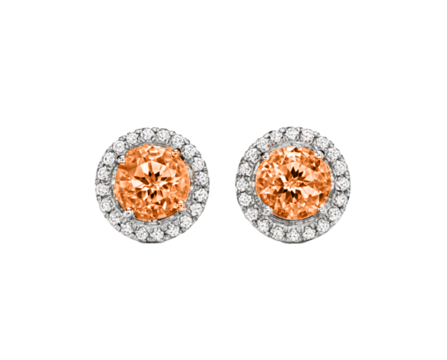 A 0.75-carat round-cut Mandarin Garnet set in a double halo of 0.50-carat pavé diamonds. Crafted in 18K white gold with additional pavé diamonds on the band, bringing the total carat weight to 1.25.