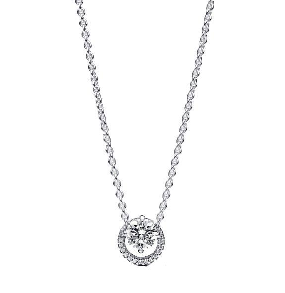 Featuring a 0.70-carat brilliant-cut center diamond and a halo of 22 smaller diamonds, this 18k white gold piece weighs 0.40 carats in accent stones.