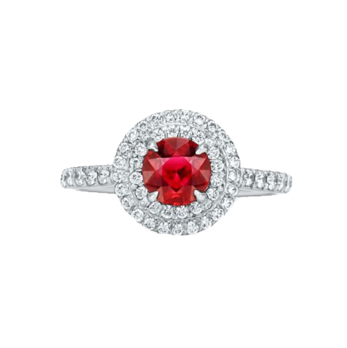 A 0.75-carat round-cut ruby set in a double halo of 0.50-carat pavé diamonds. Crafted in 18K white gold with additional pavé diamonds on the band, bringing the total carat weight to 1.25.