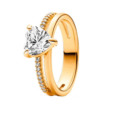 A 0.75-carat heart-cut Diamand in a eighteen-carat yellow gold with diamonds on the band, bringing the total carat weight to 1.25.